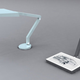 Illustration for article titled Desk Lamp Rotates To Become a Light Box For Artists